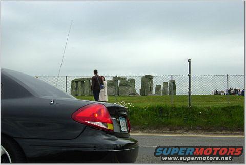 Black 2004 Ford Taurus sedan, rear view, showing taillight and antenna