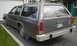1987 Ford Crown Victoria LTD - Rear angle from driver's side. It shows the worst of the rust on Shaggin' ... the bottom corner of the tailgate and the driver's lower rear…