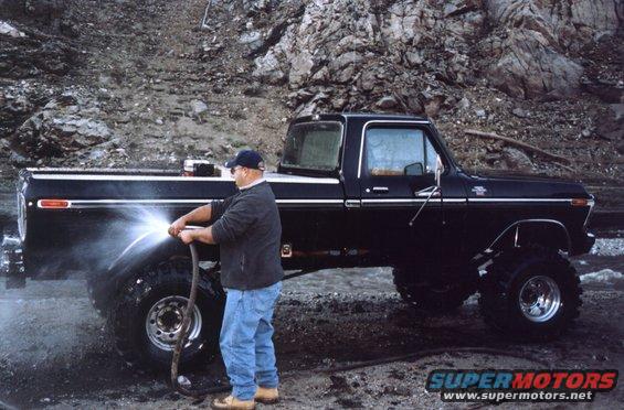 Gil washing pops truck.