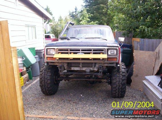 Front view of a 1983 Ford Bronco with snorkel and large tires