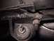 1968 Ford Mustang - Close-up of a corroded steering bracket, showing bolts and metal fatigue.