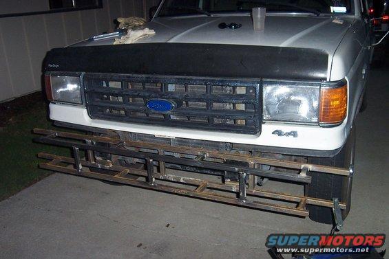 Ford truck front end with a custom metal bumper being fabricated