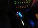 2000 Ford Taurus - The illuminated dashboard and gear shifter glow in the dark interior of a vehicle.