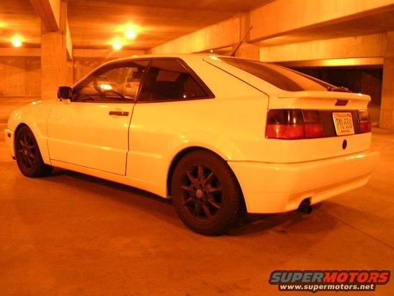 White 1990 Volkswagen Corrado rear quarter view with black wheels