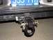 2000 Chevrolet Tahoe - A close-up view of a trailer hitch and a license plate on a vehicle's rear.