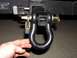 2000 Chevrolet Tahoe - A trailer hitch assembly is shown with a shackle and two locks, one of which has a blue casing.