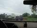 1988 Ford Bronco - Stuck in traffic on the highway during a cloudy day.