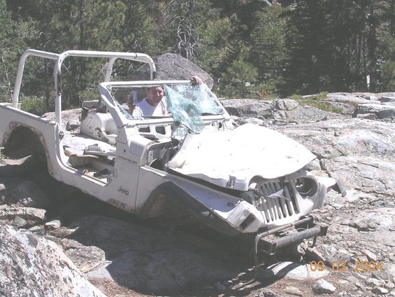 jeep.jpg just before decending to the first water crossing, we came across this jeep.  used to be lower down on the hill, at the water