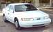 1993 Ford Taurus - Taken 03/18/2003 with the alarm installed, window tint done, one dual-head dash strobe in the front window, and nicer-looking wheels.