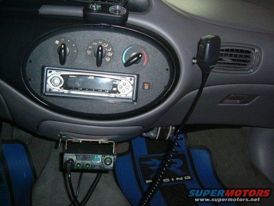 Dashboard of a 1996 Ford Taurus with JVC stereo and CB radio installed