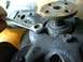 Remove the bolts holding the fan to the clutch and re-install them, and the fan, onto the new clutch...