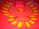 1985 Ford Bronco - A red car hood displays a prominent phoenix decal with flame-like wings.