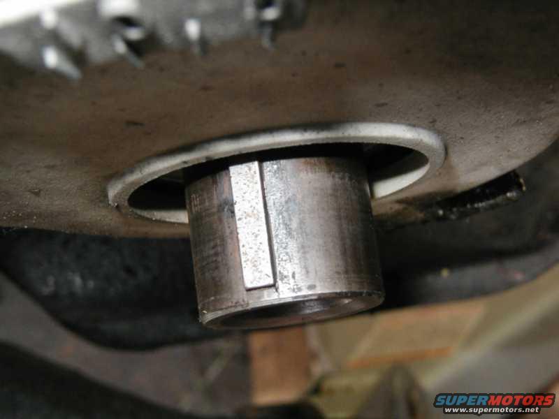 Close-up of a metal shaft with a keyway, part of an engine or transmission