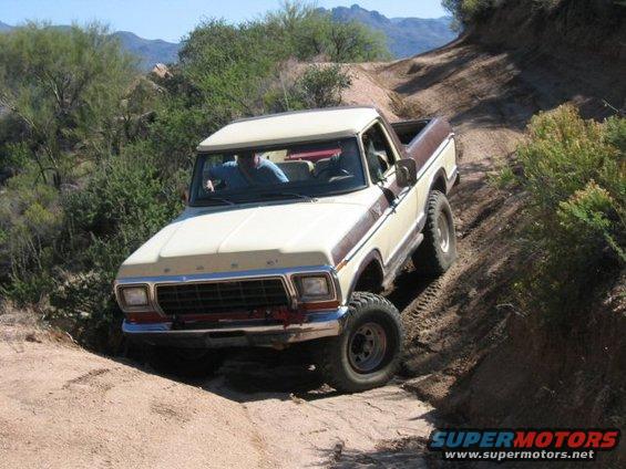 Ford F-Series truck going off-road on a dirt trail
