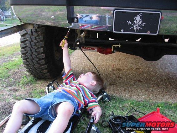 prestonbroncowork92004.jpg My 3 year old working on the truck while Dad takes a break.