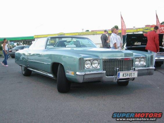 Light blue 1971 Cadillac Eldorado convertible with chrome grille and side trim. License plate reads KS US 1