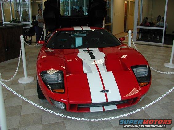 Red and white striped Ford GT, front view, doors open