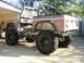1995 Ford Bronco - This modified 1978 Ford Bronco is shown with its doors removed and a roll cage installed.