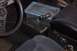 1966 Ford Fairlane - Interior view of a car's floor shifter and seats, with some visible text on the shifter handle.