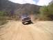 1989 Ford Bronco - This 1989 Ford Bronco is navigating a challenging off-road trail.