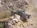 1989 Ford Bronco - This 1989 Ford Bronco is tackling a challenging off-road course on a dusty, rocky hillside.
