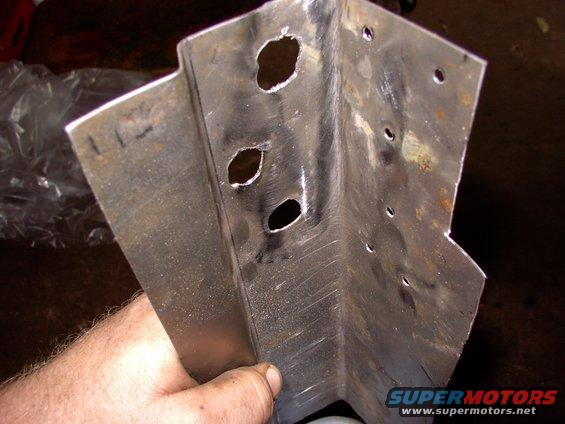 img_0151.jpg Got the 2X4 metal brake out and fabbed this piece up.  To pull it into the corner I employed the actual taligate hinge as it has great pulling force and it's own washered nuts.