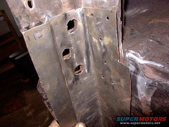 Not bad fit for on the spot fabrication with the rubber mallet.  The small holes are to allow a few button welds. Just beat into place for fit.