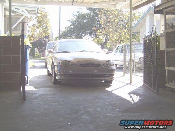 1998 Mercury Sable parked under a carport, front view