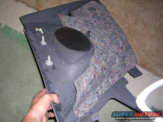 car door panel with speaker and insulation removed