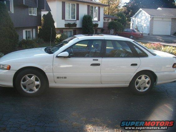 White 1993 Ford Taurus sedan, side view