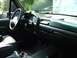 1993 Ford Bronco - Interior view of a 1993 Ford Bronco, showing the dashboard, steering wheel, and seats.