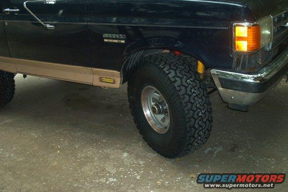 wide view of tires at full lock (again its dark, sorry)