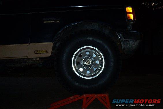 bronco-002.jpg front right tire on ramp, still inches away from body (dark again)