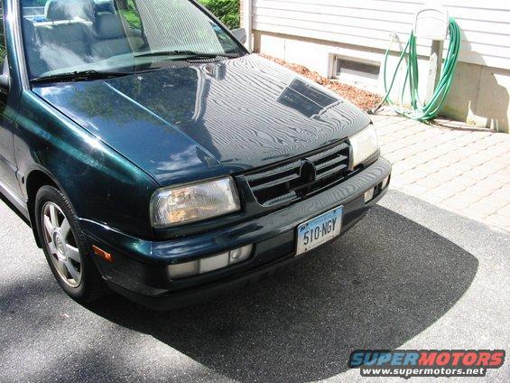 Dark green 1999 Volkswagen Jetta convertible front view with license plate 510-NGY