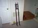 2003 Ford F-150 - A motorcycle's front suspension assembly is shown standing upright indoors.