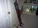 2003 Ford F-150 - Motorcycle front suspension forks are shown leaning against a wall indoors, with a bar cabinet in the background.