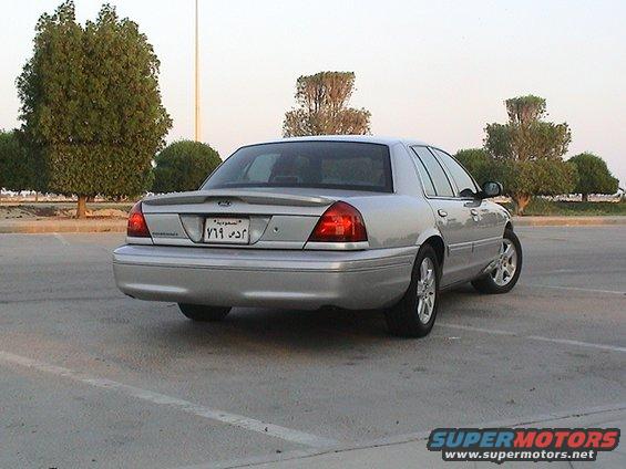Silver 2004 Ford Crown Victoria sedan, rear view