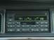 2004 Ford Crown Victoria - The dashboard radio of a 2004 Ford Crown Victoria displays the current time and CD track information.