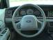 2004 Ford Crown Victoria - The interior of a 2004 Ford Crown Victoria, its dashboard, steering wheel, and instrument cluster.