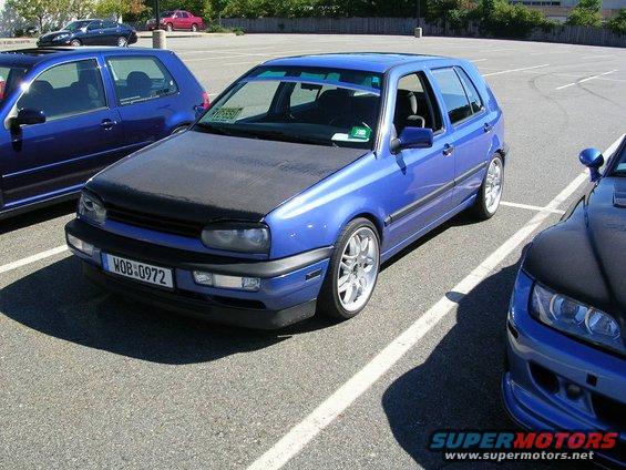 Blue 1996 Volkswagen GTI 3q-front view with black hood