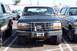 1990 Ford Bronco - Black Ford Bronco with aftermarket winch and brush guard, parked in a lot.