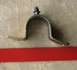 1999 Ford Crown Victoria - A metal bracket with a black plastic clip is shown against a concrete background, with a red bar below and a Supermotors.net logo at the bo…