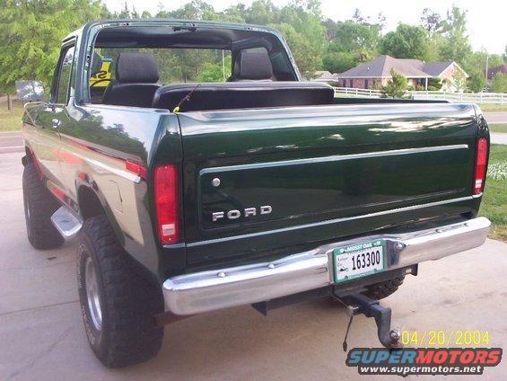 1978 Ford Bronco rear view, green exterior, chrome bumper, and license plate