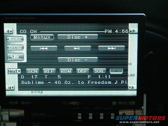 Kenwood car stereo screen displaying CD information and playback controls