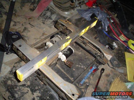 removed the seat frames with a 10mm 1/4" ratchet and socket so could level the seats out.