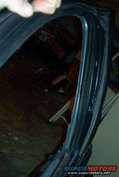 You can see how the exterior trim/frame pieces have pulled away from the actual doorframe... bad news..... that means the body shop ain't gonna fix that one.... time for a new door!