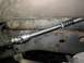 1984 Dodge Ram Van - This image shows a close-up view of a vehicle's steering shaft and universal joint assembly.