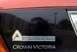 2000 Ford Crown Victoria - Close-up of the rear of a vehicle showing manufacturer and dealer badging.