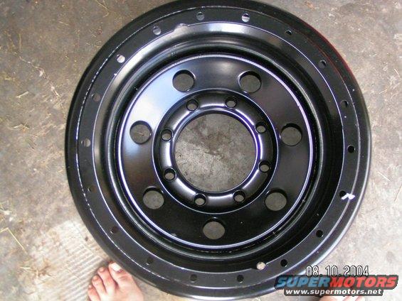 Black steel wheel with multiple lug holes