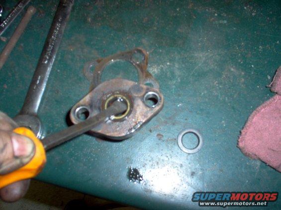 3-abs-seal.jpg The ABS seal is probably the most overlooked seal, but it seems to be a MAJOR source of leaks, judging by the amount of grime on the brake line bracket.